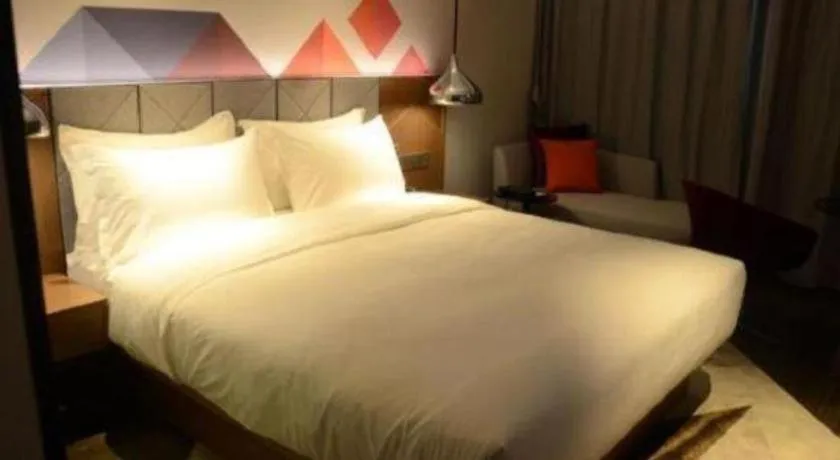 Bed in Borrman Hotel Zhanjiang Xuwen Port Terminal