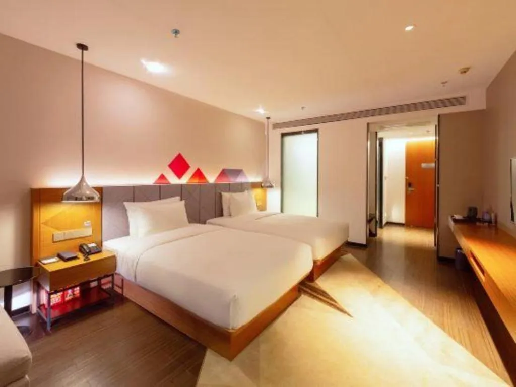 Bed in Borrman Hotel Zhanjiang Xuwen Port Terminal