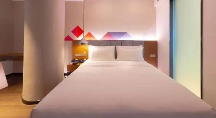 Bed in Borrman Hotel Zhanjiang Xuwen Port Terminal