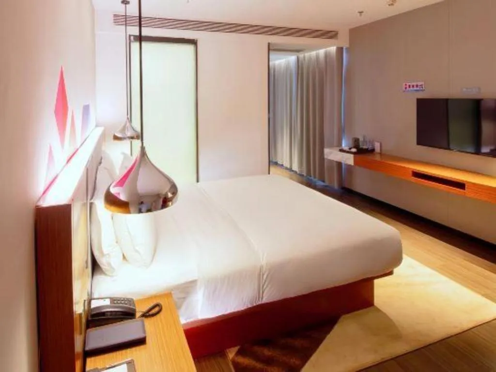 Bed in Borrman Hotel Zhanjiang Xuwen Port Terminal