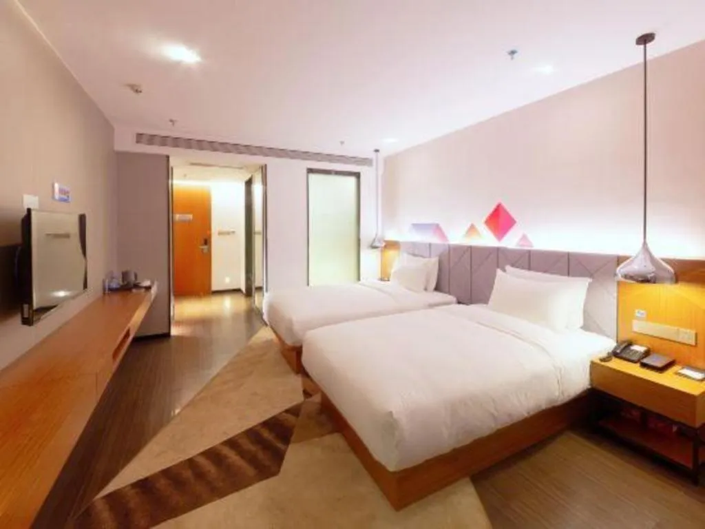 Bed in Borrman Hotel Zhanjiang Xuwen Port Terminal