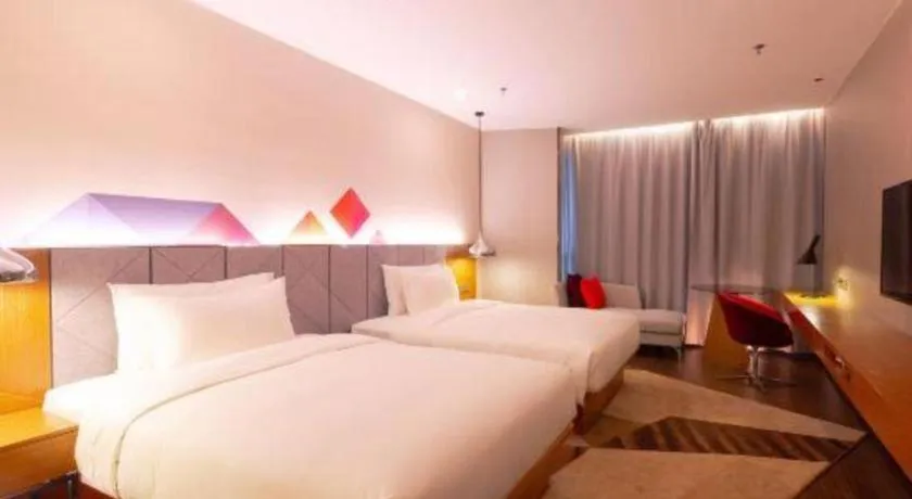 Bed in Borrman Hotel Zhanjiang Xuwen Port Terminal