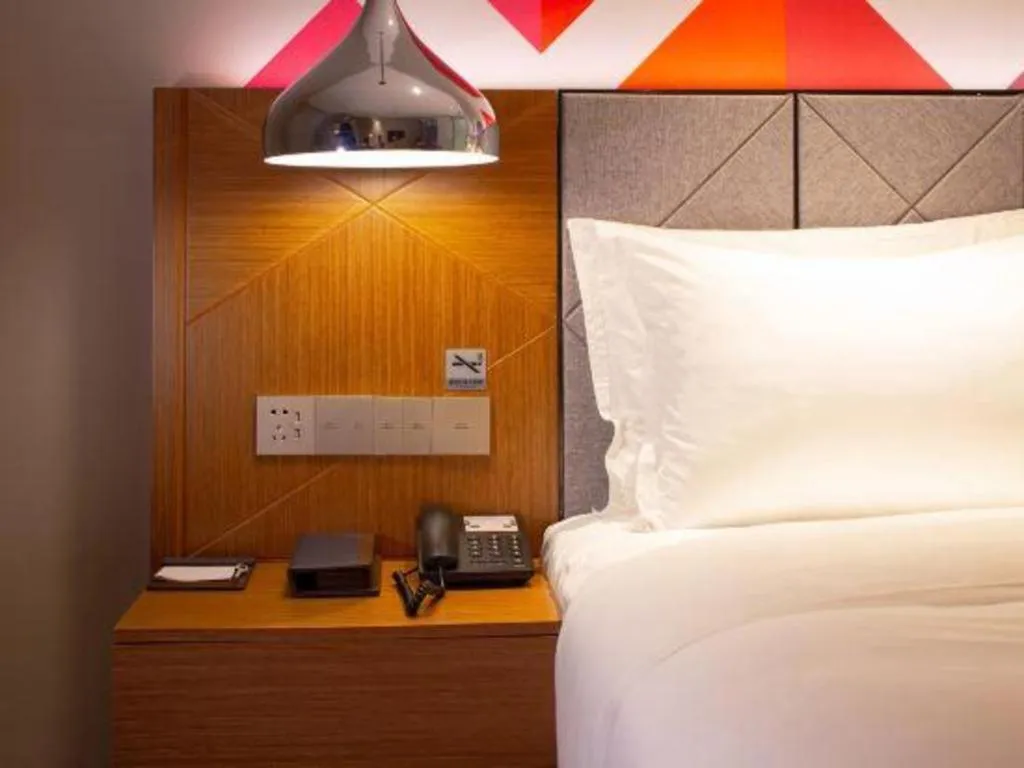 Bed in Borrman Hotel Zhanjiang Xuwen Port Terminal