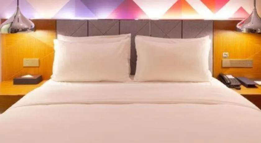 Bed in Borrman Hotel Zhanjiang Xuwen Port Terminal