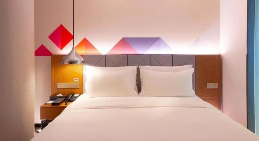 Bed in Borrman Hotel Zhanjiang Xuwen Port Terminal