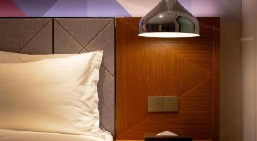 Bed in Borrman Hotel Zhanjiang Xuwen Port Terminal