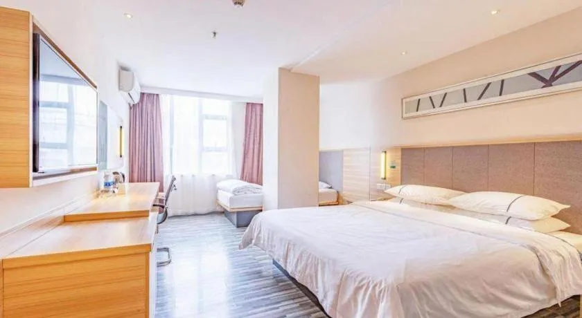 Bed in City Comfort Inn Shenzhen International Exhibition Center Tangwei Metro Station