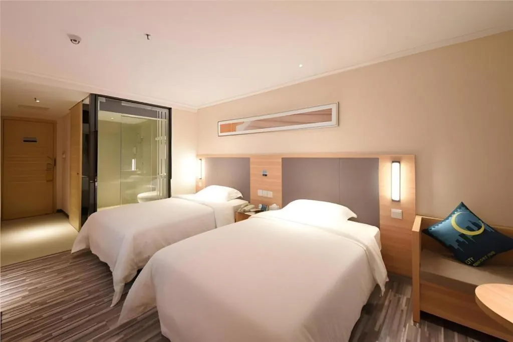 Bed in City Comfort Inn Shenzhen International Exhibition Center Tangwei Metro Station