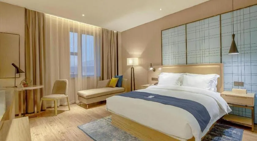 Bed in Echarm Hotel Liuzhou High-speed Railway Station