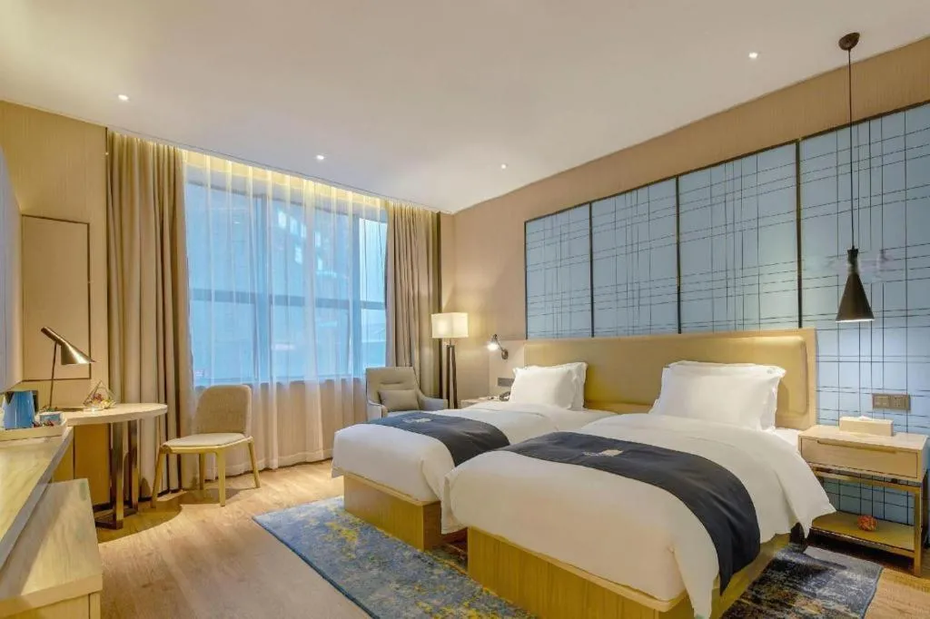 Bed in Echarm Hotel Liuzhou High-speed Railway Station
