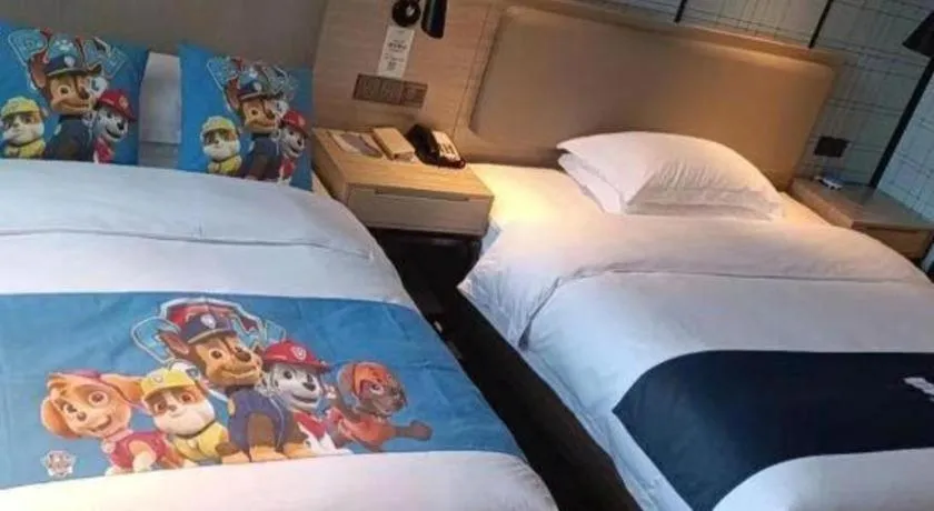 Bed in Echarm Hotel Liuzhou High-speed Railway Station