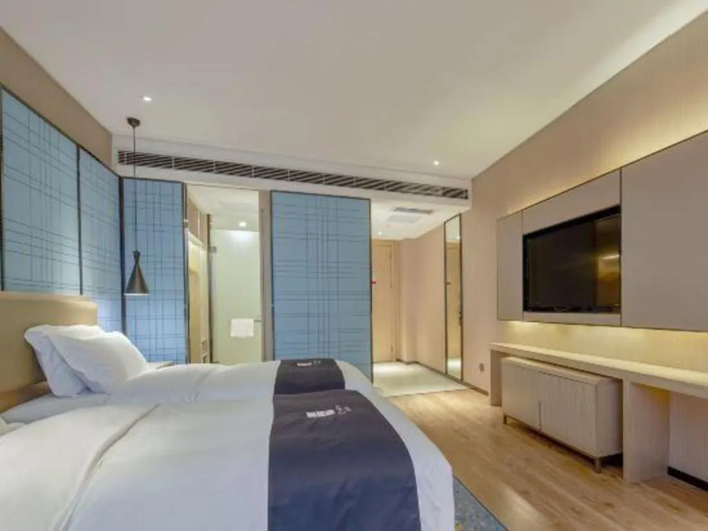 Bed in Echarm Hotel Liuzhou High-speed Railway Station