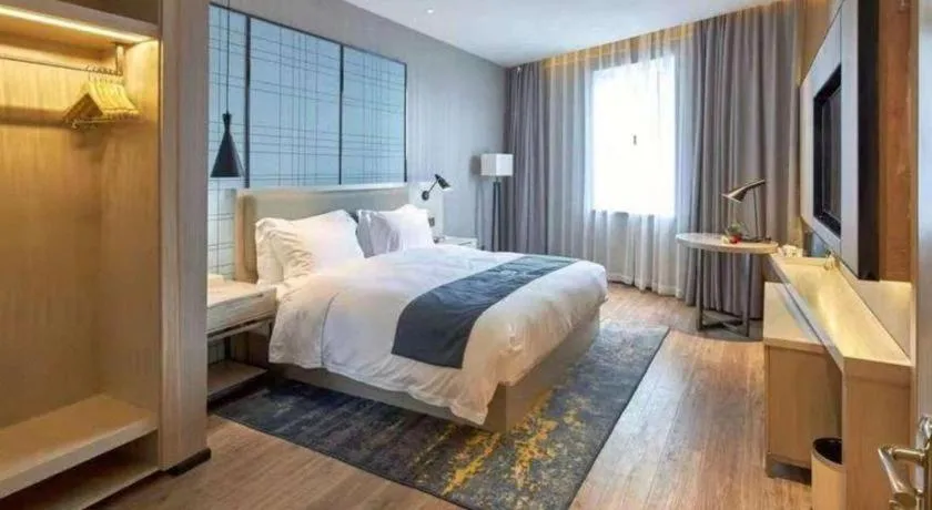 Bed in Echarm Hotel Liuzhou High-speed Railway Station