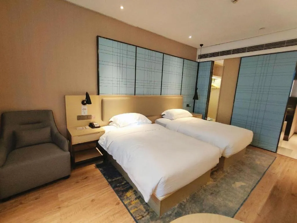 Bed in Echarm Hotel Liuzhou High-speed Railway Station