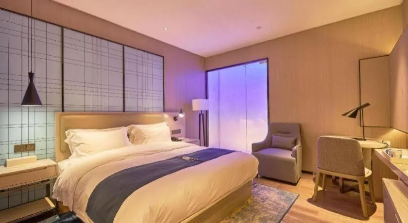 Bed in Echarm Hotel Liuzhou High-speed Railway Station