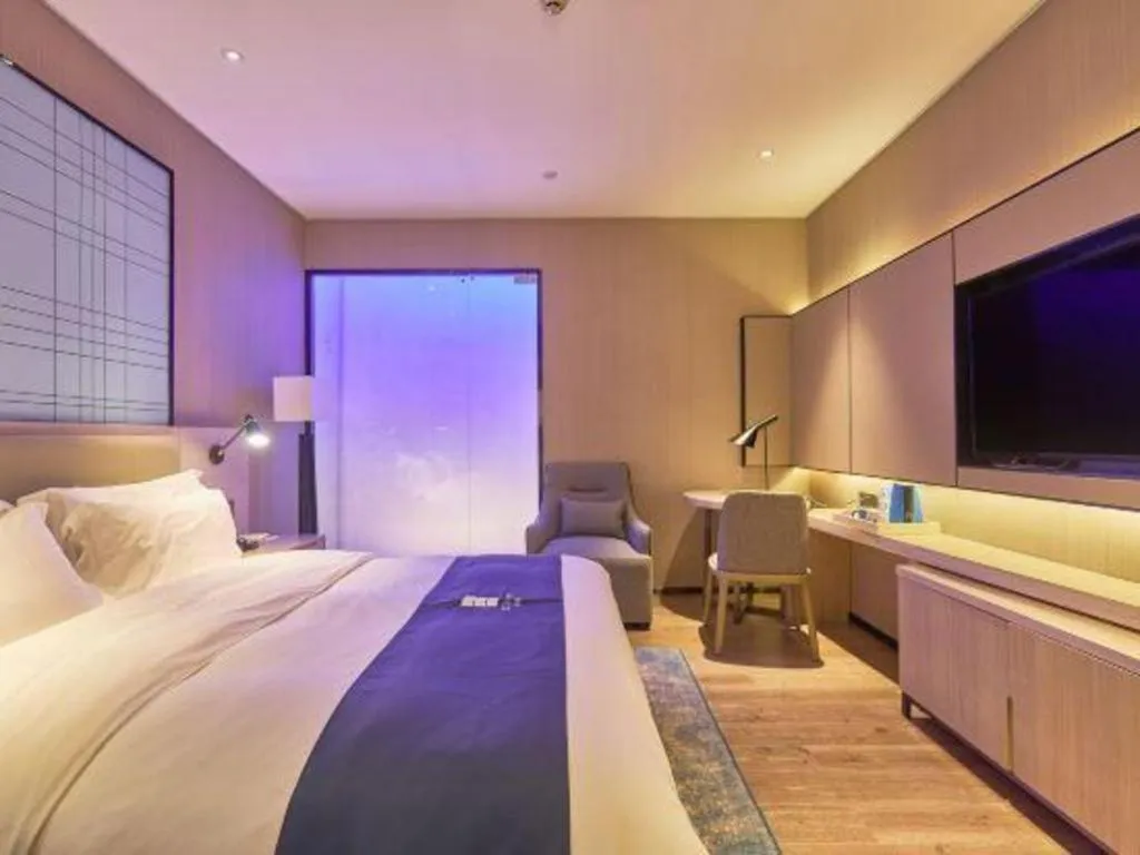 Bed in Echarm Hotel Liuzhou High-speed Railway Station