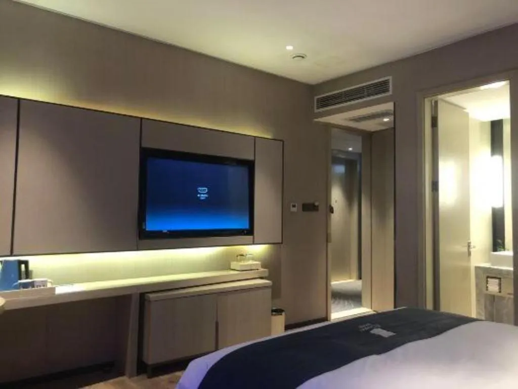 Bed in Echarm Hotel Liuzhou High-speed Railway Station