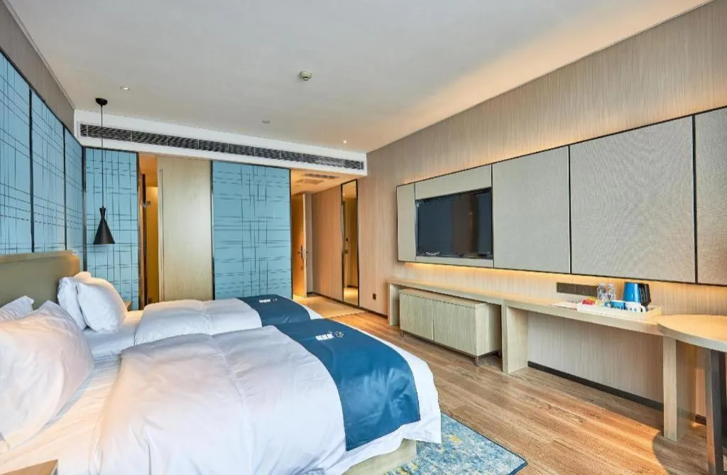 Bed in Echarm Hotel Liuzhou High-speed Railway Station