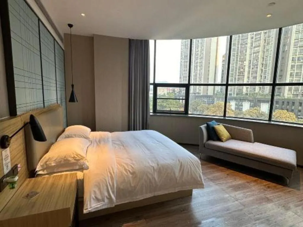 Bed in Echarm Hotel Liuzhou High-speed Railway Station