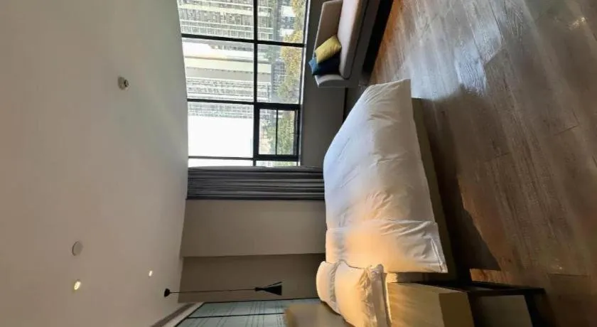 Bed in Echarm Hotel Liuzhou High-speed Railway Station