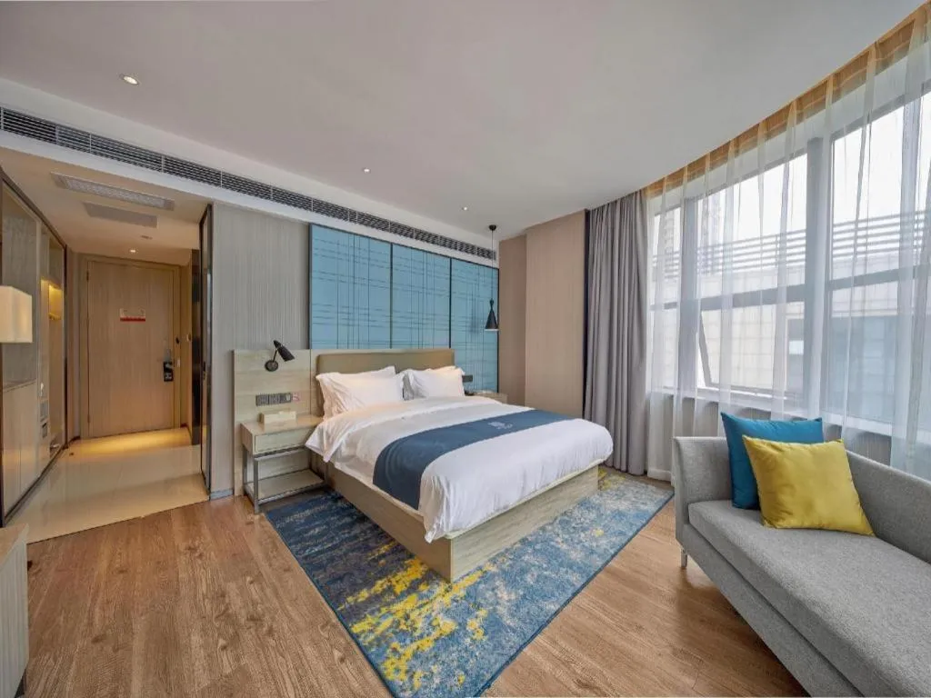 Bed in Echarm Hotel Liuzhou High-speed Railway Station