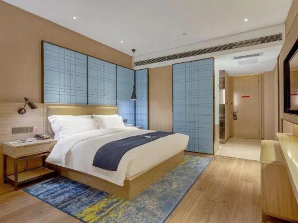 Bed in Echarm Hotel Liuzhou High-speed Railway Station