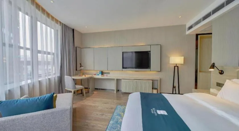 Bed in Echarm Hotel Liuzhou High-speed Railway Station