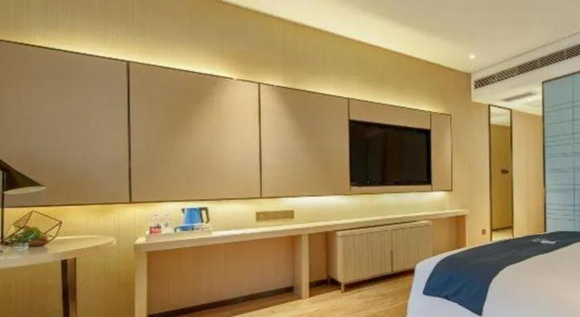 Bed in Echarm Hotel Liuzhou High-speed Railway Station