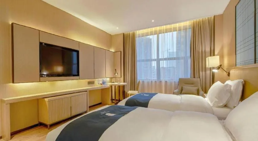 Bed in Echarm Hotel Liuzhou High-speed Railway Station