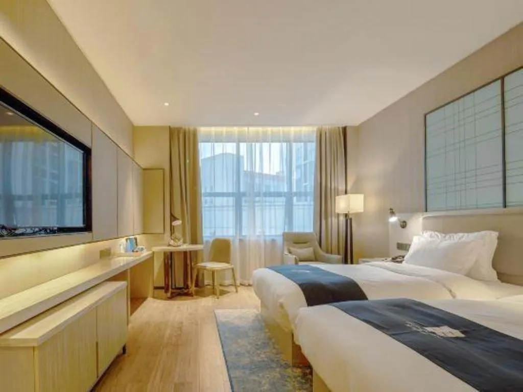 Bed in Echarm Hotel Liuzhou High-speed Railway Station