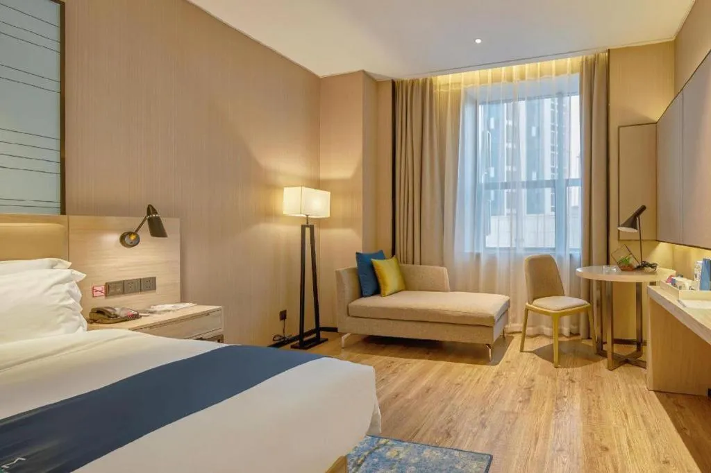 Bed in Echarm Hotel Liuzhou High-speed Railway Station