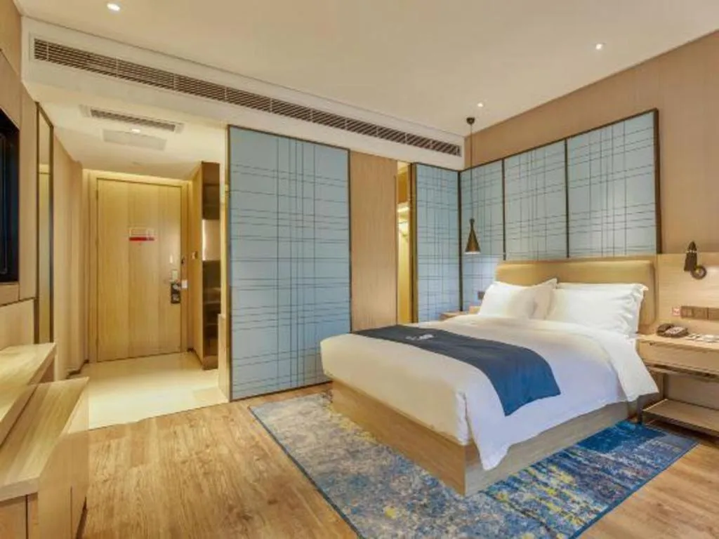 Bed in Echarm Hotel Liuzhou High-speed Railway Station