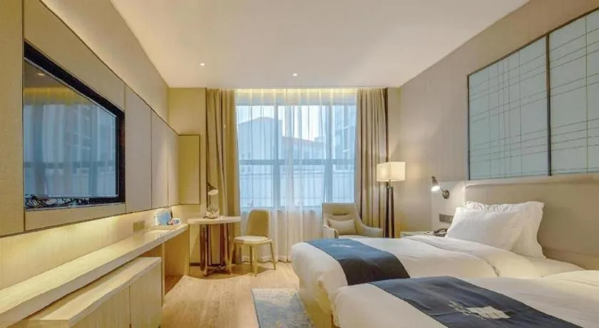 Bed in Echarm Hotel Liuzhou High-speed Railway Station