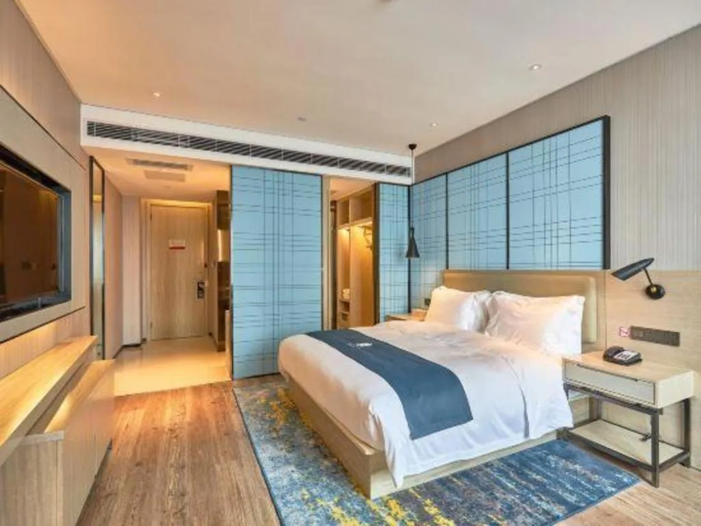 Bed in Echarm Hotel Liuzhou High-speed Railway Station