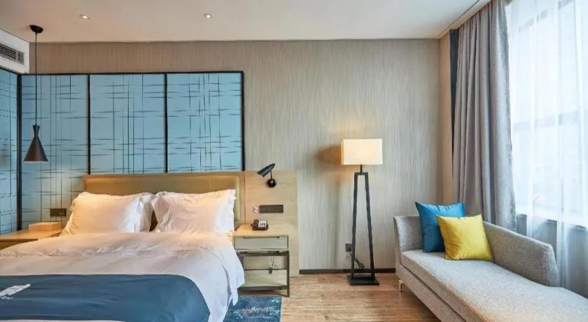 Bed in Echarm Hotel Liuzhou High-speed Railway Station