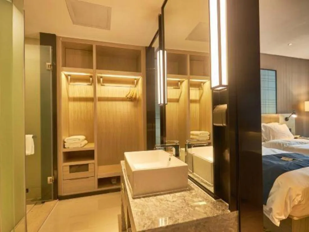 Bed in Echarm Hotel Liuzhou High-speed Railway Station