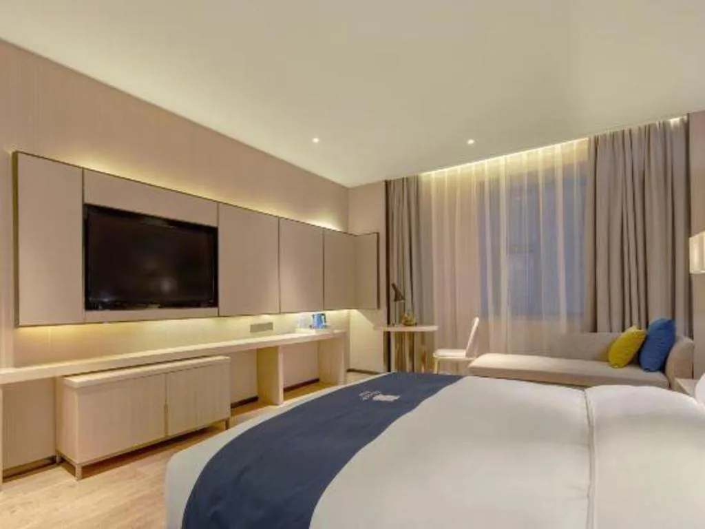 Bed in Echarm Hotel Liuzhou High-speed Railway Station