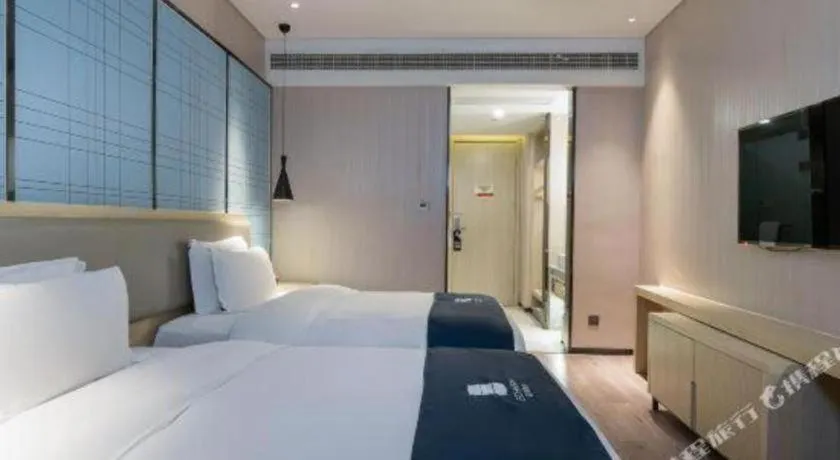 Bed in Echarm Hotel Nanning Qingxiu Mountain