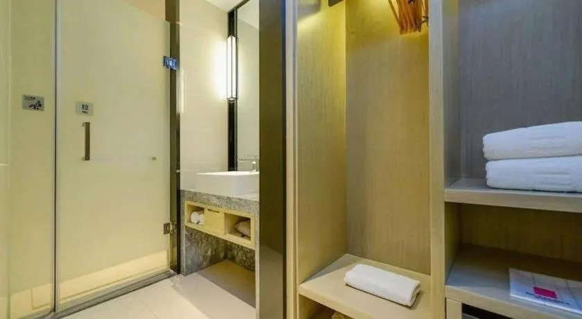 Bed in Echarm Hotel Nanning Qingxiu Mountain