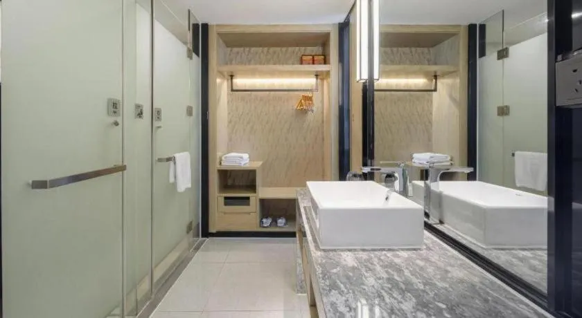 Bed in Echarm Hotel Nanning Qingxiu Mountain