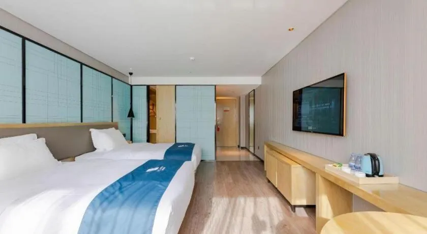 Bed in Echarm Hotel Nanning Qingxiu Mountain