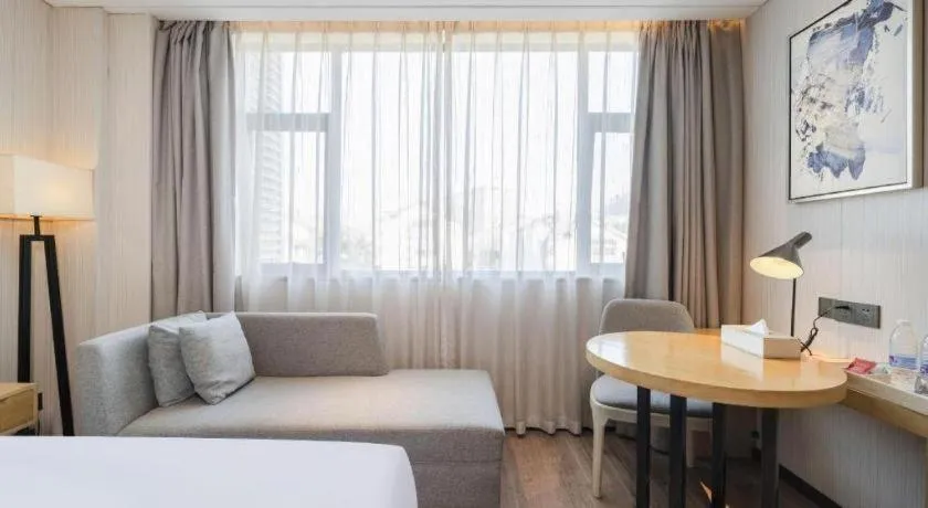 Bed in Echarm Hotel Nanning Qingxiu Mountain