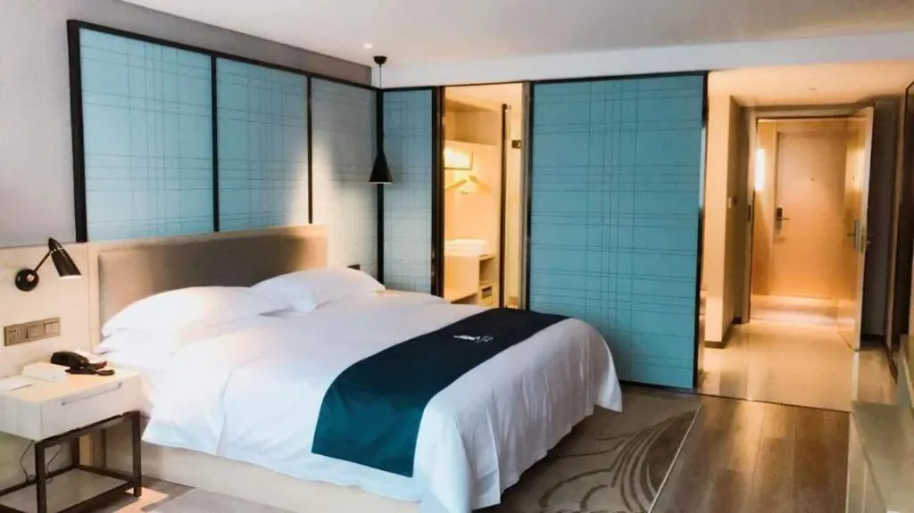 Bed in Echarm Hotel Nanning Qingxiu Mountain