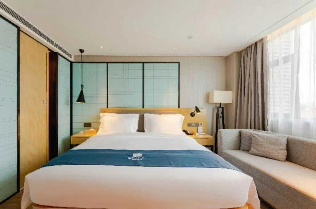 Bed in Echarm Hotel Nanning Qingxiu Mountain