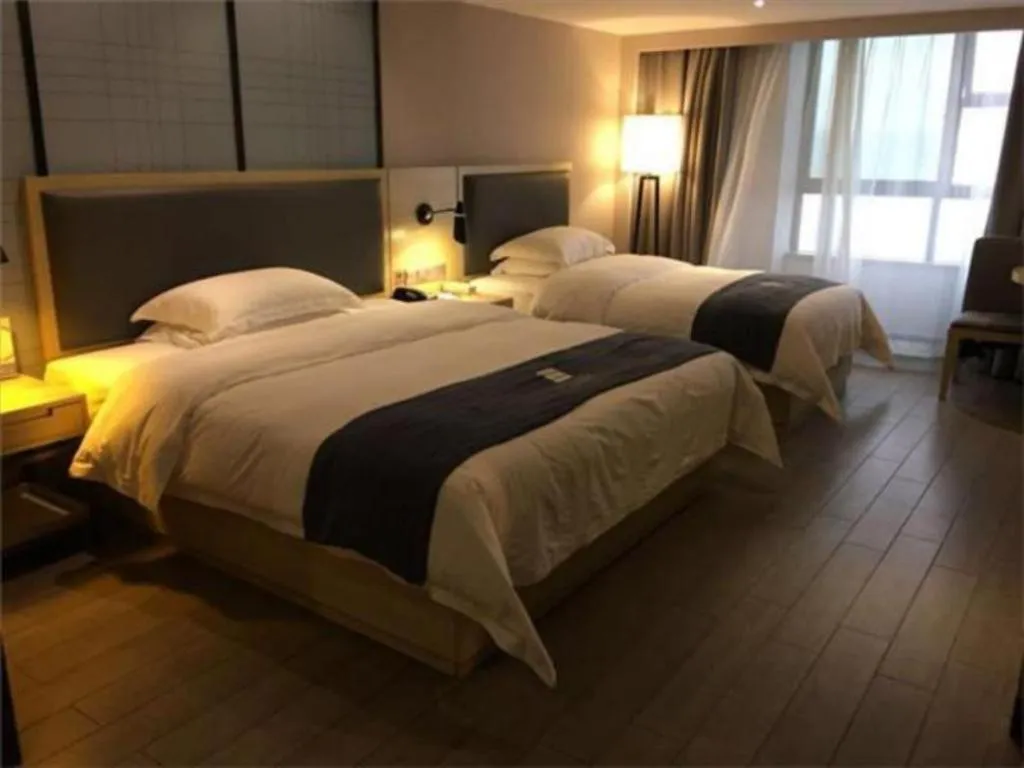 Bed in Echarm Hotel Nanning Qingxiu Mountain