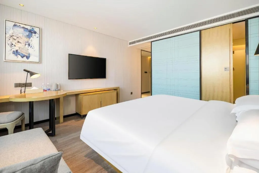 Bed in Echarm Hotel Nanning Qingxiu Mountain