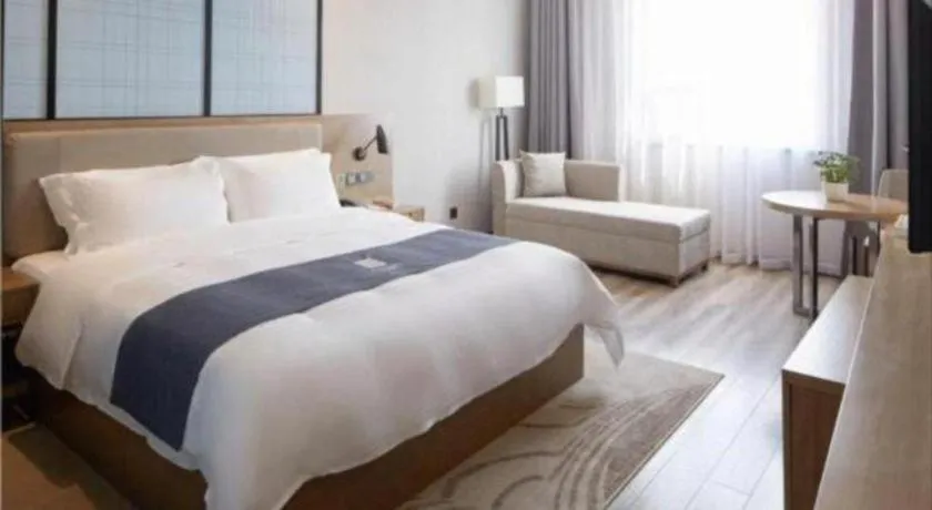 Bed in Echarm Hotel Nanning Qingxiu Mountain