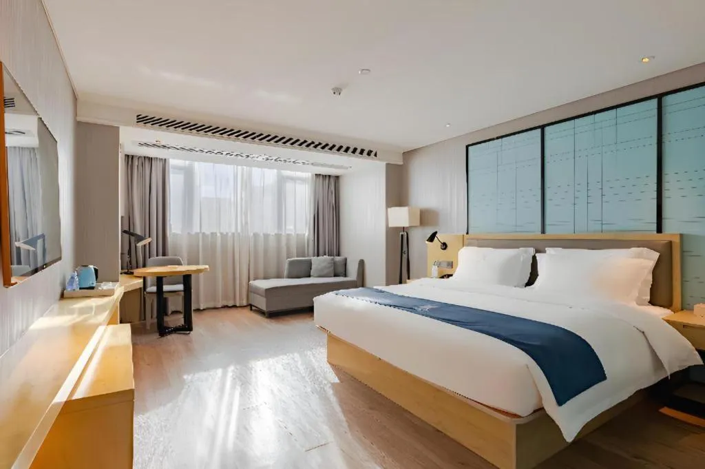 Bed in Echarm Hotel Nanning Qingxiu Mountain