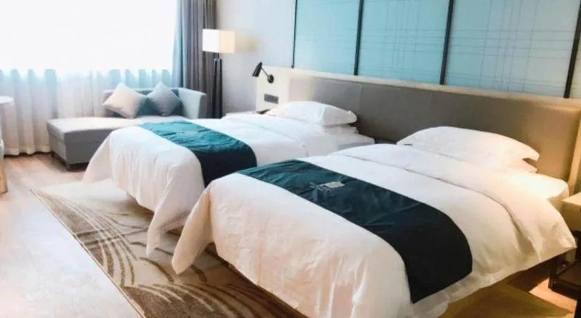 Bed in Echarm Hotel Nanning Qingxiu Mountain