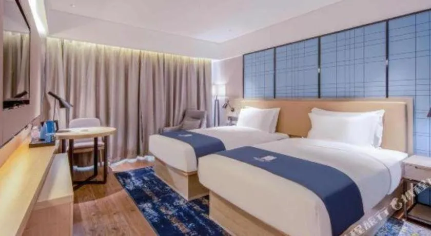 Bed in Echarm Hotel Nanning Qingxiu Mountain